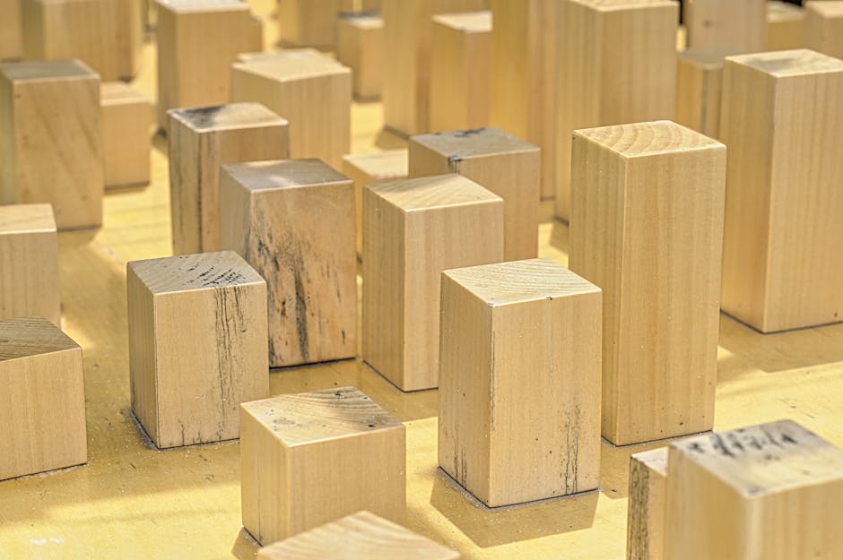 Käsemasse in einer Pressform aus Holz
